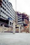 View of the constructed main building from the first level excavation pit.